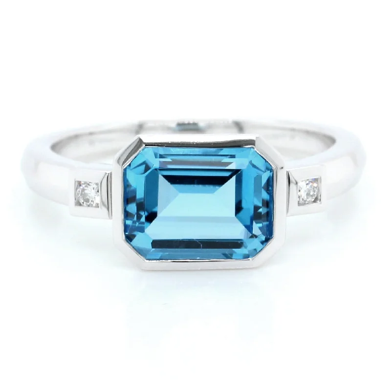 14K White Gold Emerald Cut Blue Topaz Ring