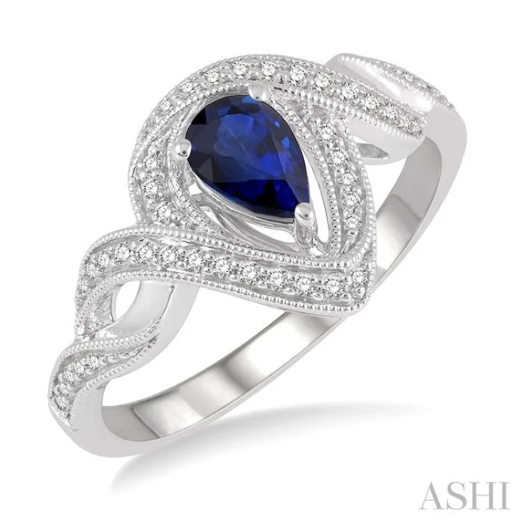 1/6 Ctw Twisted Bypass 6X4 MM Pear Cut Sapphire & Round Cut Diamond Precious Ring in 10K White Gold